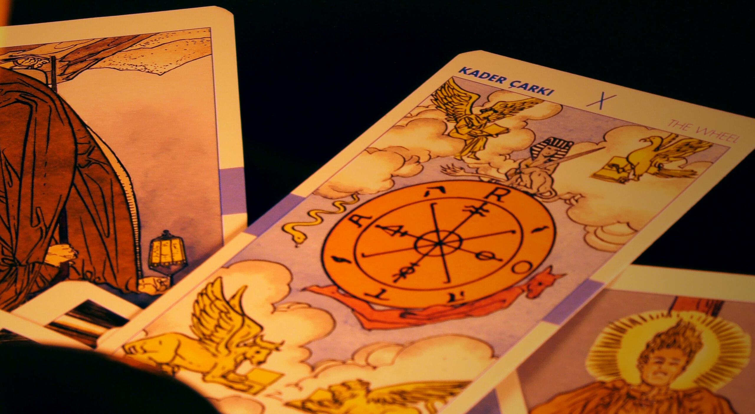 tarot cards wheel of fortune tarot card against black background